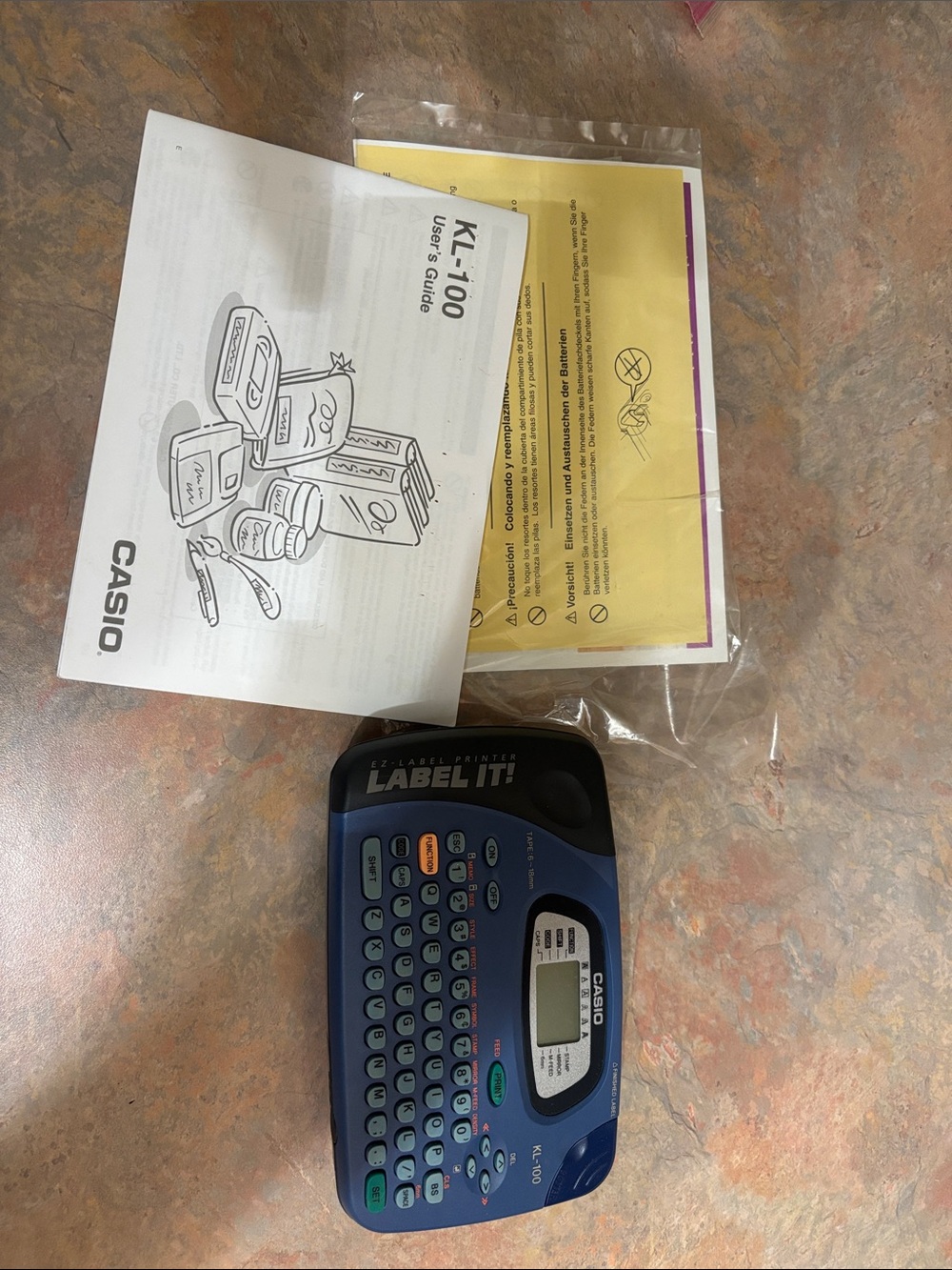 Casio KL-100 Label It! Handheld Label Maker in Blue and Black